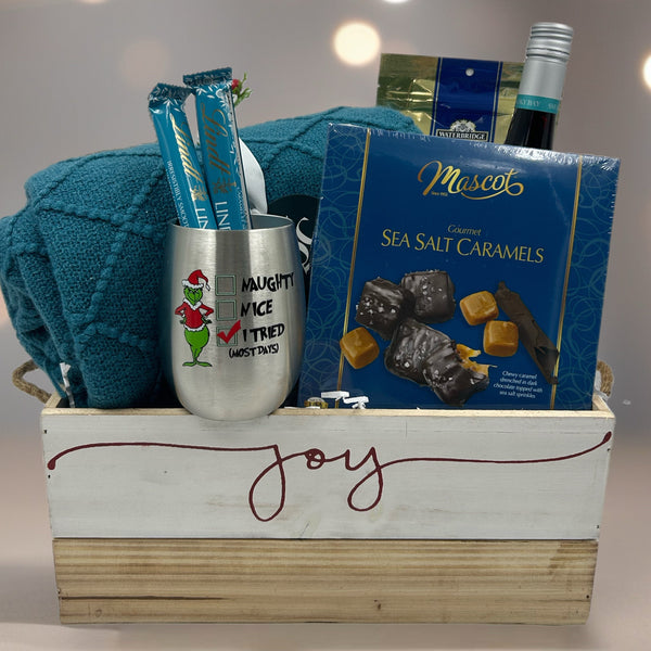 throw, stainless steel stemless glass, wine, caramels, toffee, lindor chocolates.  Christmas Gift Baskets in Ottawa