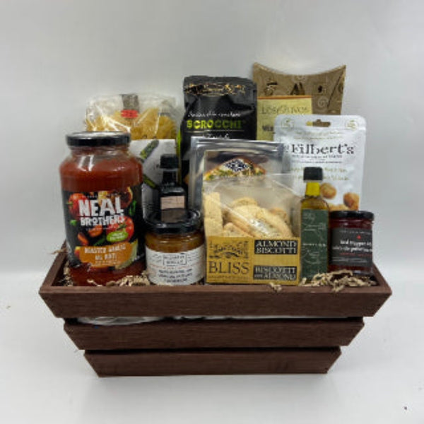 smoked salmon, pasta sauce and noodles, assorted crackers, olive oil and balsamic vinegar, delicious spreads, bisotti, nuts and dip seasoning. Closing Gifts in Ottawa. Realtor Gifts in Ottawa.  Birthday Gift Baskets in Ottawa.