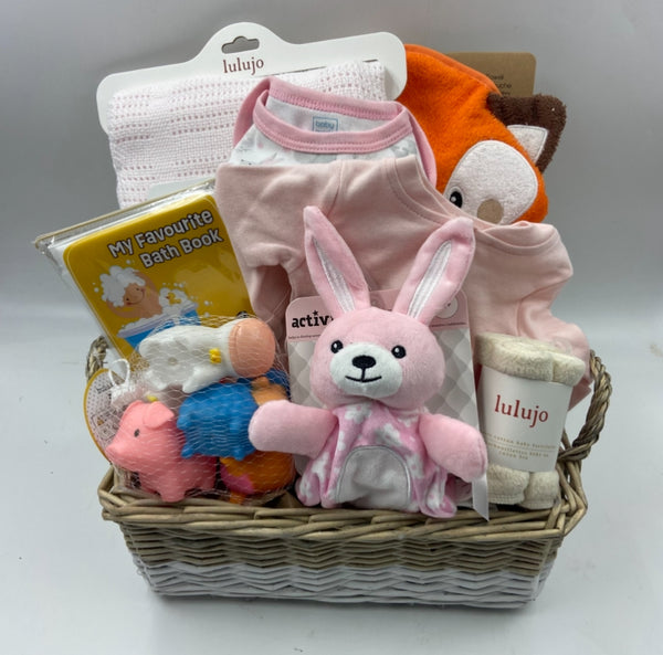 Fox hooded towel, blanket, bath book and bath toys, sleeper, onesie, plush toy and face cloths.  Baby Gift Baskets in Ottawa
