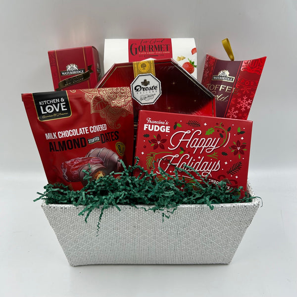 estive basket is brimming with the ultimate indulgence, featuring a delightful assortment of cookies, fudge, toffee, truffles, chocolates, and chocolate-covered dates. It's the perfect treat for anyone looking to satisfy their sweet cravings