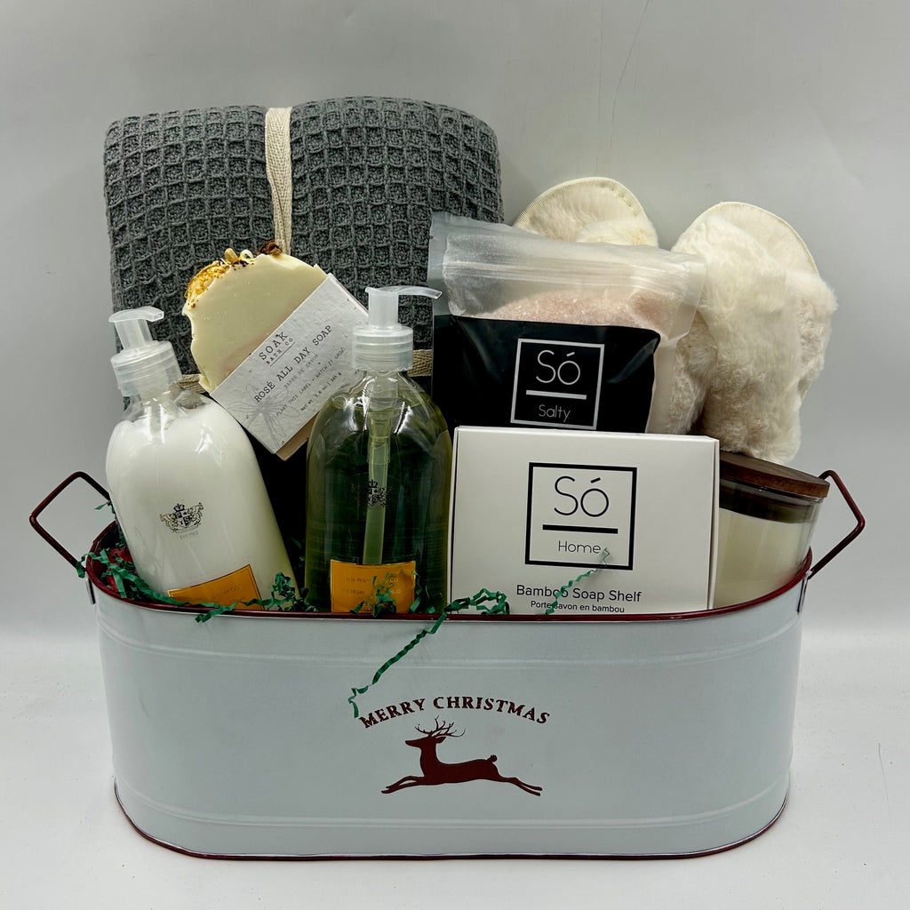  find a cozy blanket and slippers, a lightly scented all-natural candle, luxurious soap and lotion from The Perth Soap Co., soothing bath salts and a bamboo soap dish from So Luxury, and the most amazing smelling soap from Soak