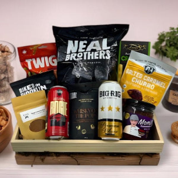 Our wooden crate with tostitos and local salsa, pretzels, breadsticks, nuts, bbq seasoning, whisky infused popcorn and 2 craft beer