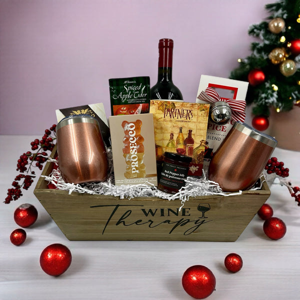 wine, crackers, tumblers, candy, jam, apple cider, mulling spices, cheese.  Gift Baskets in Ottawa
