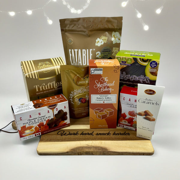 Engraved acacia wood cutting board with snacks.  Office Christmas gifts ottawa